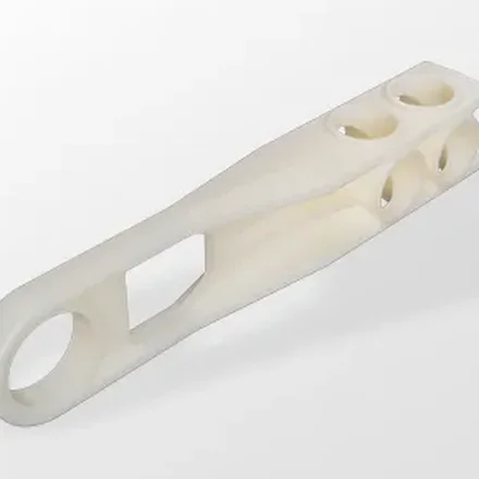 Mit Kohlenstoffdraht verstärktes und umspritztes Werkstück
